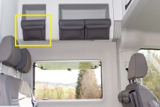 UTILITIES  storage cabinet above the seating area of VW Grand California 680 